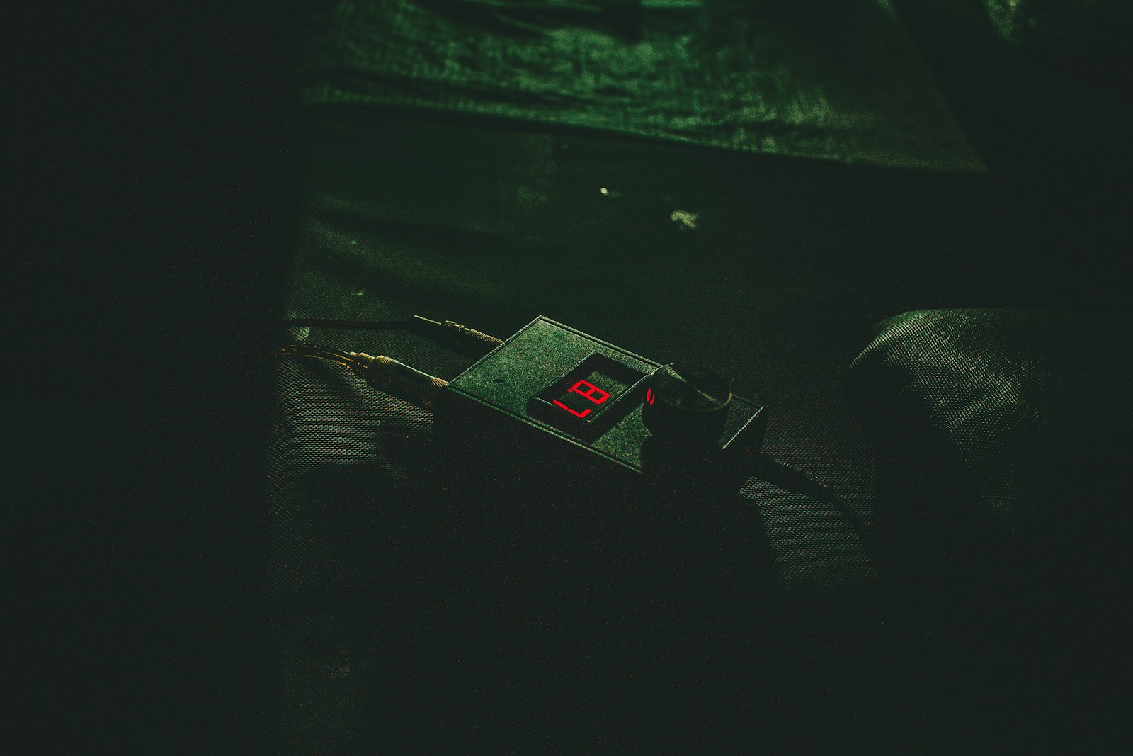 black digital device with the number 87